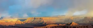 Dead Prints: USA, Utah. Panoramic. Sunset light breaking through desert storm clouds