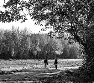 Pacific Prints: USA, Washington State, Fall City black and white two bike riders along Neal Rd