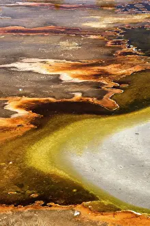 USA, Wyoming. Colorful abstract designs of hydrothermal pools near Great Fountain Geyser, Yellowstone National Park. Date: 29-09-2020