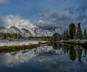 : USA, Wyoming. Fall snow and reflection of Teton mountains, Grand Teton National Park Date