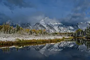 Fall Prints: USA, Wyoming. Fall snow and reflection of Teton mountains