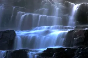 Cascading Prints: Veil fall water cascading down Tvindefossen waterfall Tvindefossen, Norway