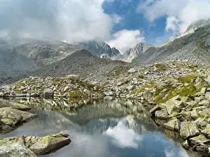 Idyllic Prints: View towards Cima Presanella draped in clouds near Rifugio Segantini