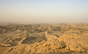 Images Dated 7th October 2007: View over the 'Moon Landscape' - As a dust storm clouds the horizon
