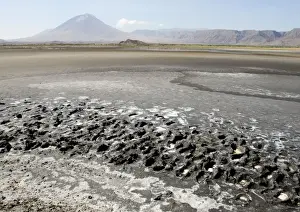 View of Oldoynio Lengai Volcano / The Mountain of God - from Lake Natron - Tanzania - Africa