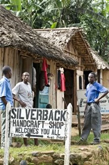 Images Dated 20th October 2008: Villagers - by handicraft shops in - start of mountain