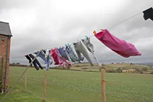 Wind Prints: Washing line of clothes blowing in high wind - Mickleton - Gloucestershire - UK