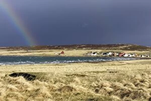 WAT-12363 Village d Ekkoroy by Varanger fjord with storm clouds and rainbow
