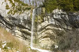 Layers Prints: Waterfall over folded Jurassic limestone strata - the Chapeau de Gendarme - near Pontarlier