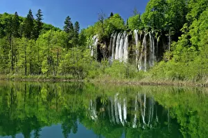 Lakes Prints: Waterfall with reflection in the upper lakes area Plitvice Lakes National Park, Croatia
