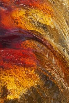 Detail of a waterfall in the Rio Tinto Red river wit