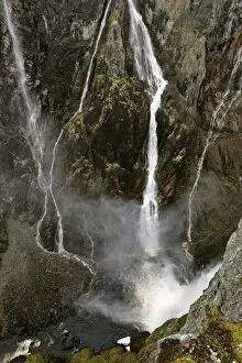 waterfalls - view into deep gorge towards the thundering water masses of Voringfossen in early spring