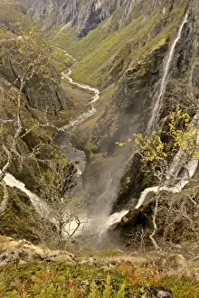 waterfalls view of the thundering water masses of Voringfossen and Simadalen in early spring Voringfossen, Hardangervidda, Fjord-Norway, Norway