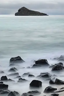 Waves Prints: Waves crashing over lava rocks on shoreline of Espanola Island