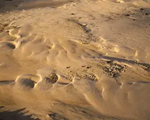 Western Australia - The Pinnacles aerial view. Limestone pillars formed underground by vertical seepage. Dissolved lime cemented. Shifting sand dunes exposed pillars in the past 200 years. Nambung National Park