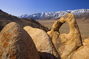 Images Dated 27th March 2009: Whitney Portal Arch - rock arch of red granite with snow-capped mountains of the Sierra Nevada