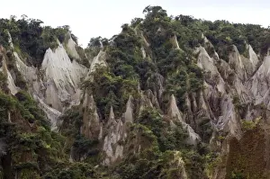 Volcanoes Prints: Wind and rain erosion of mountains of ash - lahar - formed from fallen ash of volcano Pinatubo