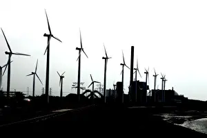 Coal Prints: Wind Turbines and coal fired power station on the Netherlands coast near Vlissingen