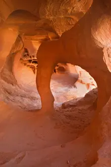 Arches Prints: Windstone - erosion sculpted arch inside a cave-like alcove of bright red sandstone - Valley of Fire State Park