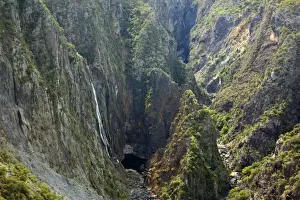 Wollomombi Falls - impressive view of this very high waterfall which drops in a very narrow and deep gorge into a plunge pool - Oxley Wild Rivers National Park, New South Wales, Australia