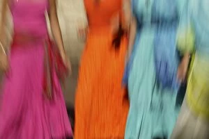 Images Dated 19th September 2004: Woman - blurred - dancing in bright colourful clothes