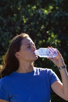 Bottles Gallery: Woman - drinking from a bottle of water