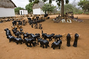 Images Dated 21st February 2006: Wooden carvings at entrance gate Tsavo West National Park, Kenya, East Africa