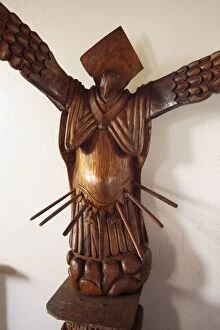 Wooden figure combining angel with birdman in the