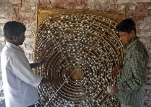 Bombyx Gallery: Workers with silkworm coccoons in an Indian silkworm