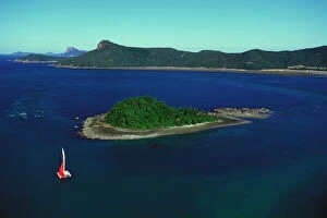 Seascape Collection: Yacht sailing past Plum Pudding Island, Whitsunday Group Whitsunday Group