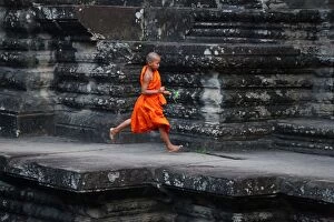 Young Buddhist monk at Angkor Wat Temple in Siem Reap, C
