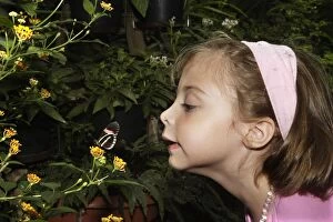 Young girl - looking at Butterfly