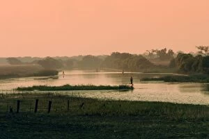 Images Dated 18th July 2004: Zambia - fishing on riverbank at sunset