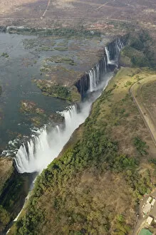Zimbabwe Gallery: Zimbabwe / Zambia - Aerial view of the Zambezi River and the Victoria Falls (1700m wide)